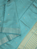 Dupion fancy saree sky blue color allover zari motifs & zari border with short pallu and attached blouse
