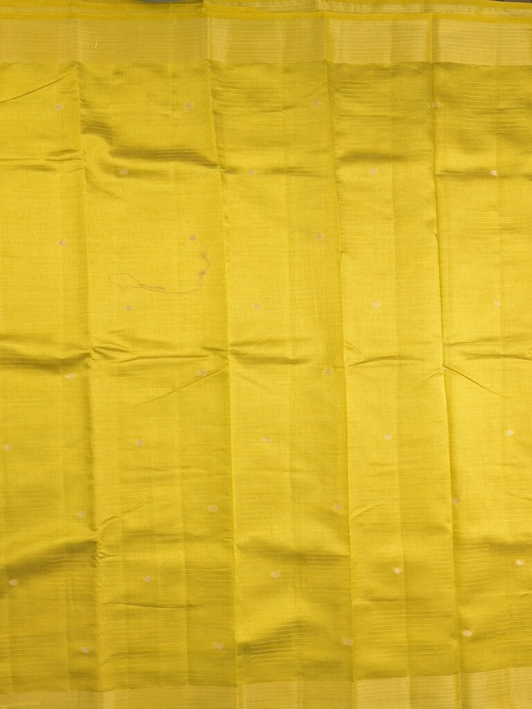 Dupion fancy saree golden yellow color allover zari motifs & zari border with short pallu and attached blouse