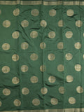 Dupion fancy saree bottle green color allover zari weaves & zari border with short pallu and attached blouse