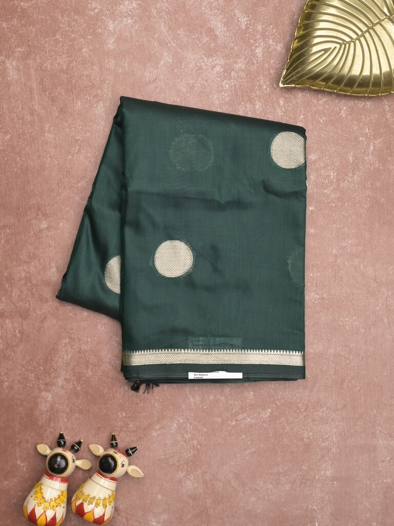 Maheshwari fancy saree dark green color allover zari motifs & zari border with zari pallu and plain blouse