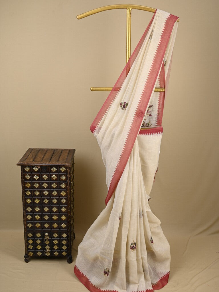 Lenin tissue embroidered fancy saree in cream color with embroidery pallu and matching blouse