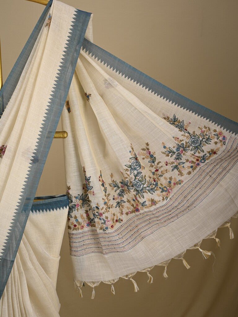 Lenin tissue embroidered fancy saree in cream color with embroidery pallu and matching blouse