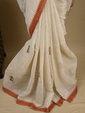 Lenin tissue embroidered fancy saree in cream color with embroidery pallu and matching blouse