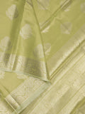 Banaras tissue fancy saree light green color allover weaves & zari border with rich pallu and self blouse