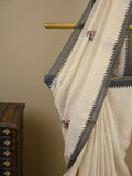 Lenin tissue embroidered fancy saree in cream color with embroidery pallu and matching blouse