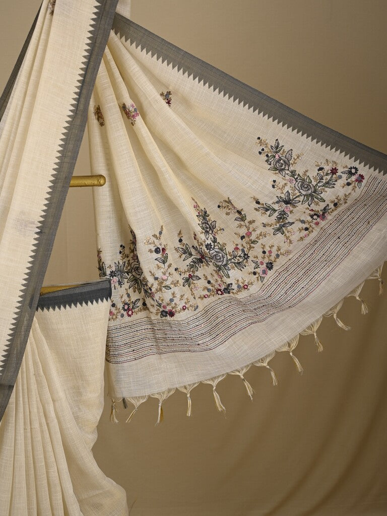 Lenin tissue embroidered fancy saree in cream color with embroidery pallu and matching blouse
