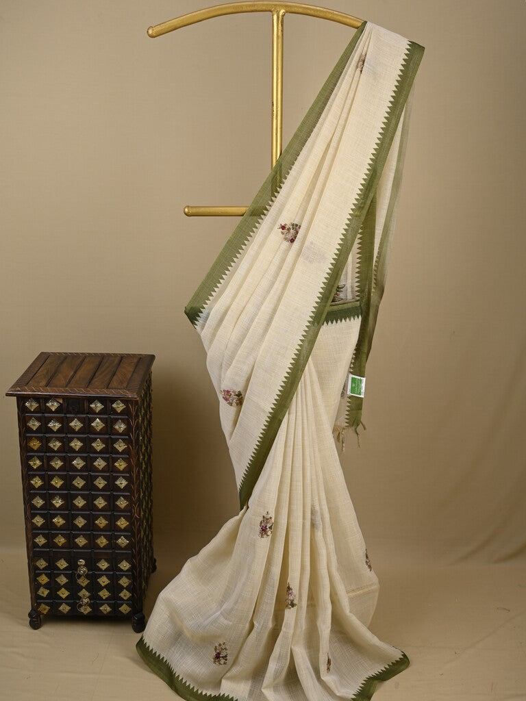 Lenin tissue embroidered fancy saree in cream color with embroidery pallu and matching blouse