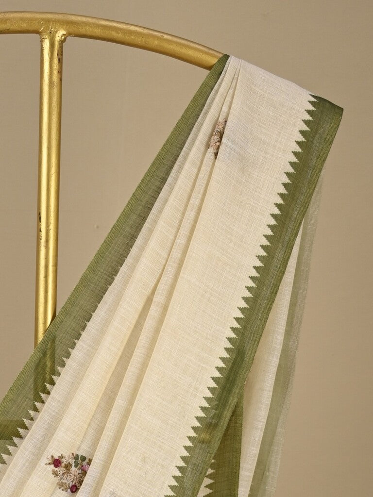 Lenin tissue embroidered fancy saree in cream color with embroidery pallu and matching blouse