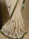 Lenin tissue embroidered fancy saree in cream color with embroidery pallu and matching blouse