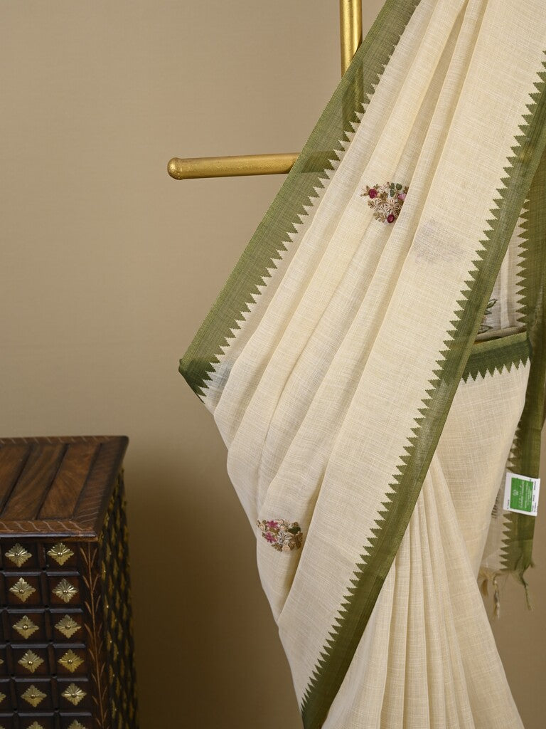 Lenin tissue embroidered fancy saree in cream color with embroidery pallu and matching blouse