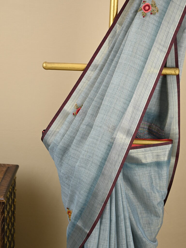 Lenin tissue embroidered fancy saree in light blue color with embroidery pallu and matching blouse