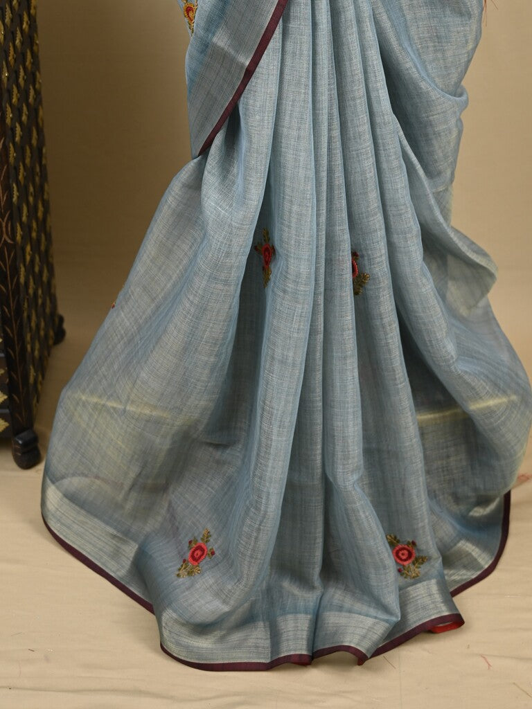Lenin tissue embroidered fancy saree in light blue color with embroidery pallu and matching blouse