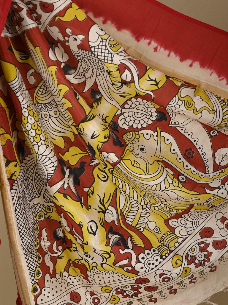 Kalamkari silk saree in yellow, featuring a contrast color border and plain matching blouse