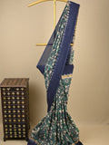 Kalamkari silk saree in blue, featuring a contrast color border and plain matching blouse