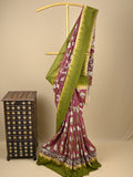 Kalamkari silk saree in pink, featuring a contrast color border and plain matching blouse