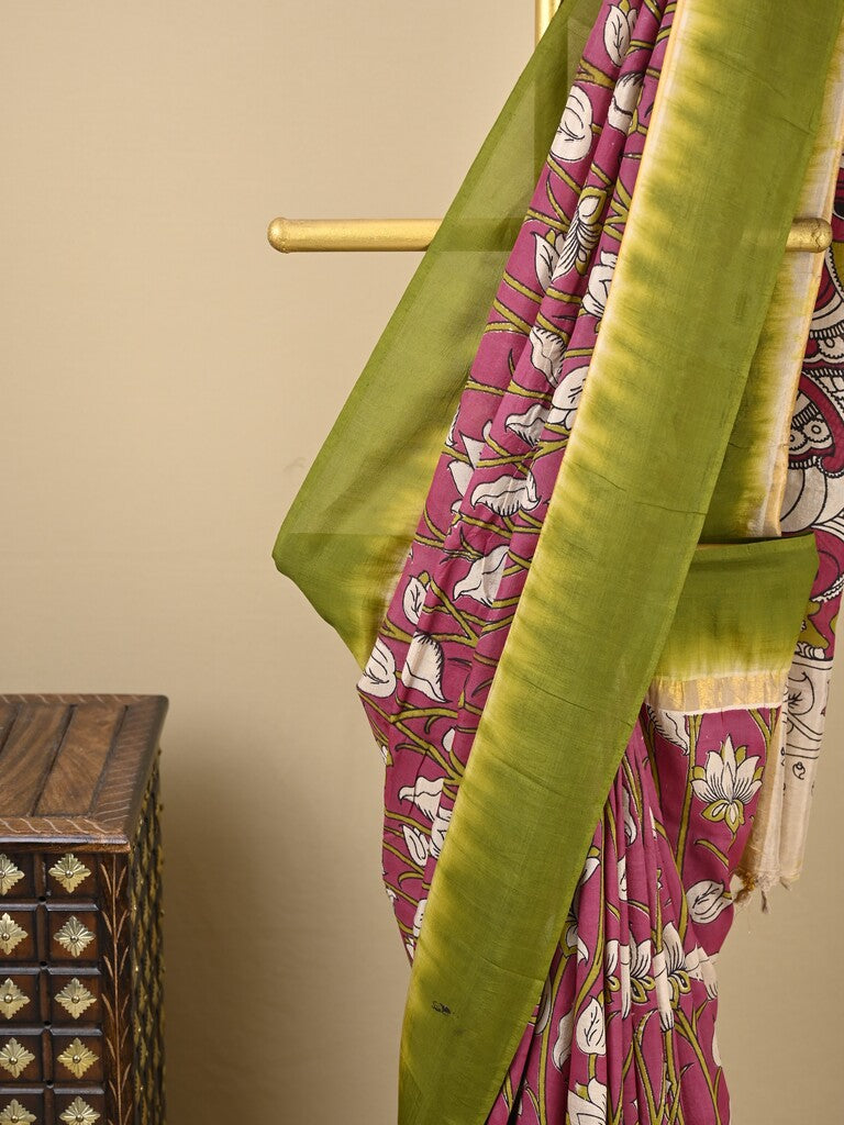 Kalamkari silk saree in pink, featuring a contrast color border and plain matching blouse