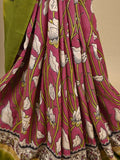 Kalamkari silk saree in pink, featuring a contrast color border and plain matching blouse