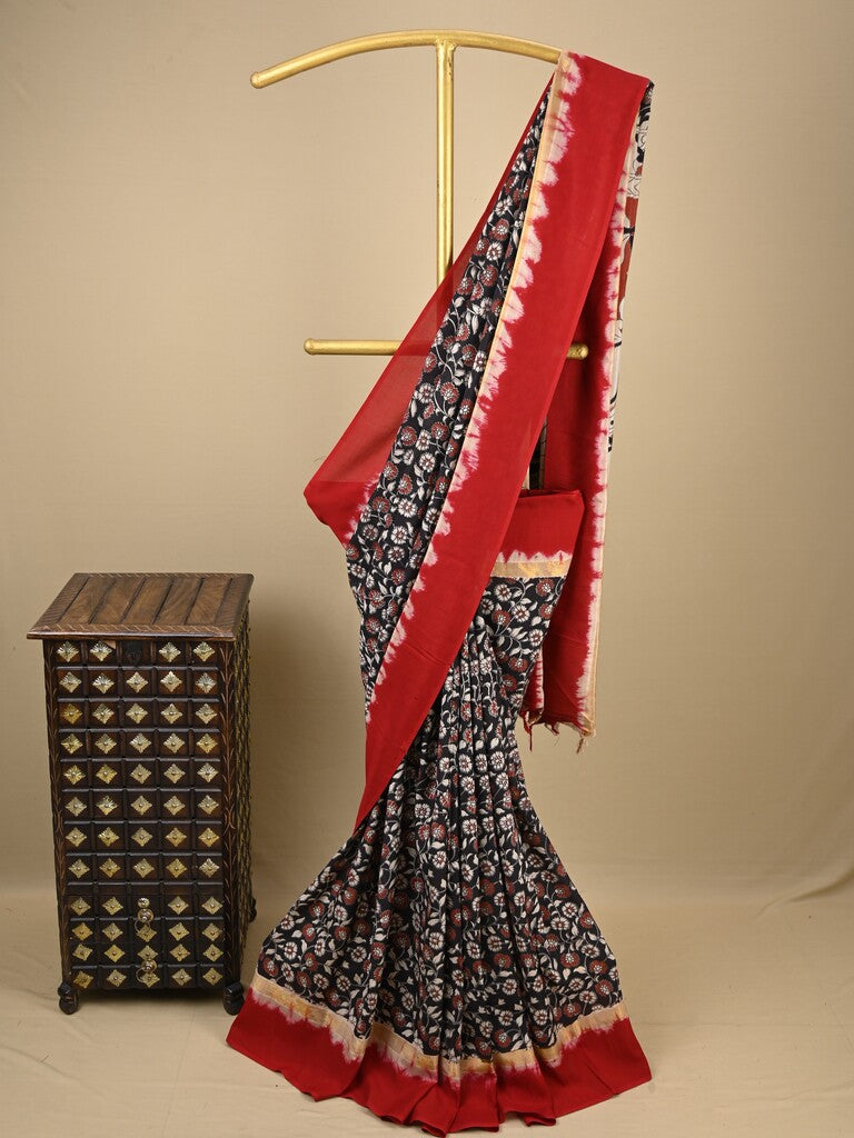 Kalamkari silk saree in black, featuring a contrast color border and plain matching blouse