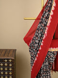 Kalamkari silk saree in black, featuring a contrast color border and plain matching blouse