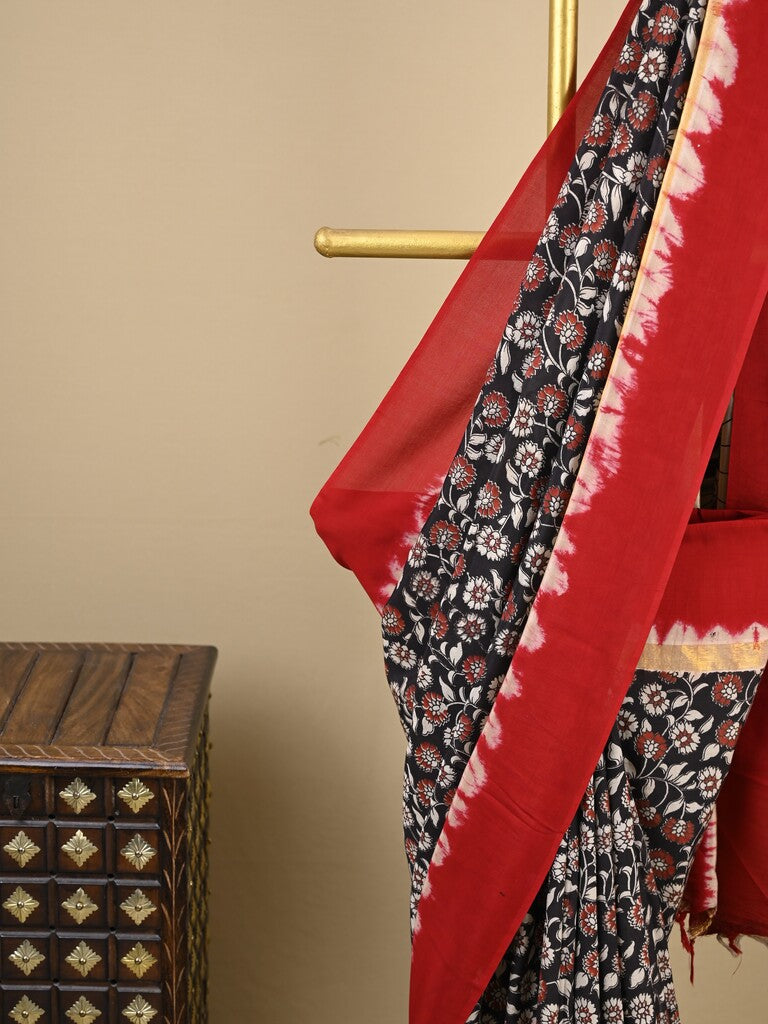 Kalamkari silk saree in black, featuring a contrast color border and plain matching blouse