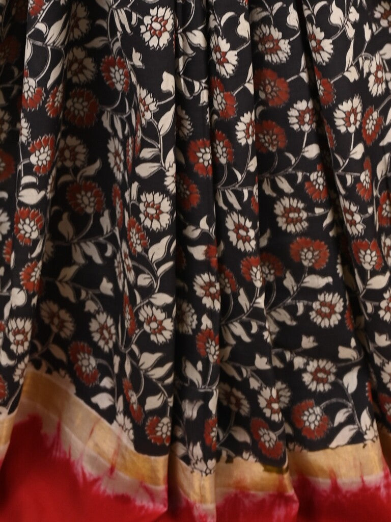 Kalamkari silk saree in black, featuring a contrast color border and plain matching blouse