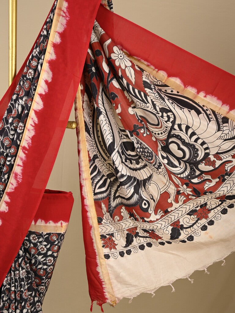 Kalamkari silk saree in black, featuring a contrast color border and plain matching blouse