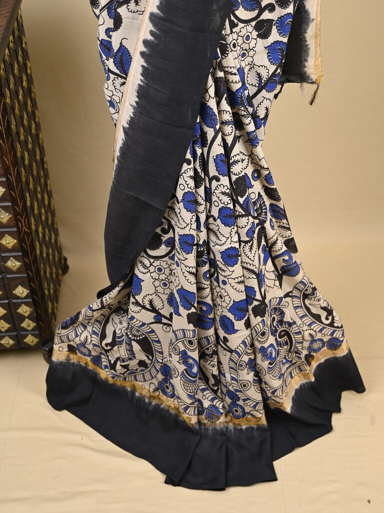 Kalamkari silk saree in white, featuring a contrast color border and plain matching blouse