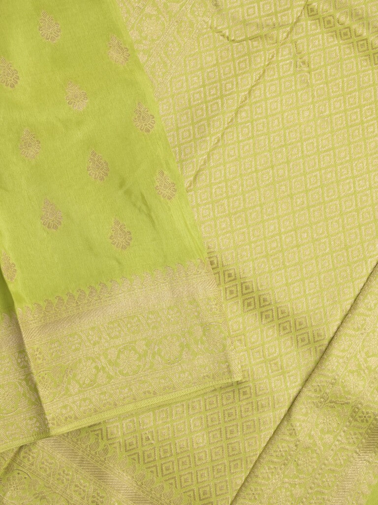 Tabby silk fancy saree parrot green color allover zari motifs & zari border with rich pallu and plain blouse