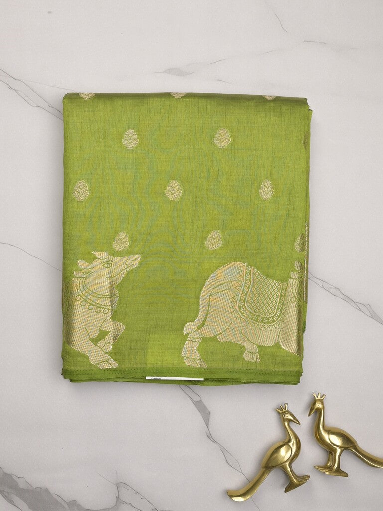 Dupion fancy saree parrot green color allover zari motifs & zari border with rich pallu and running blouse