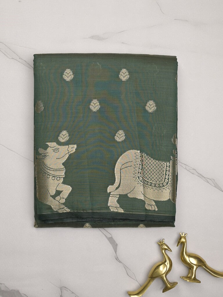 Dupion fancy saree dark green color allover zari motifs & zari border with rich pallu and running blouse
