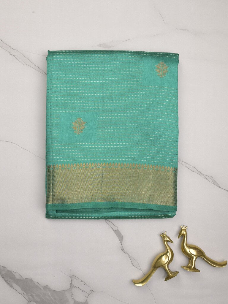 Dupion fancy saree lux green color allover zari motifs & zari border with zari pallu and contrast plain blouse
