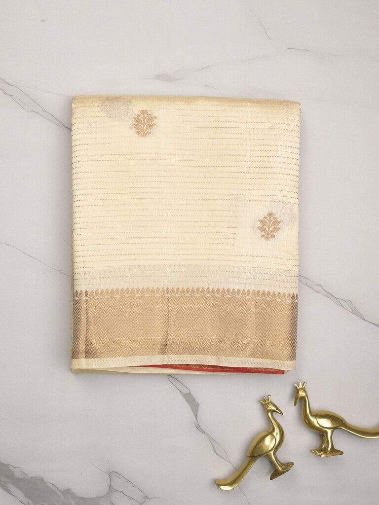 Dupion fancy saree half white color allover zari motifs & zari border with zari pallu and contrast plain blouse