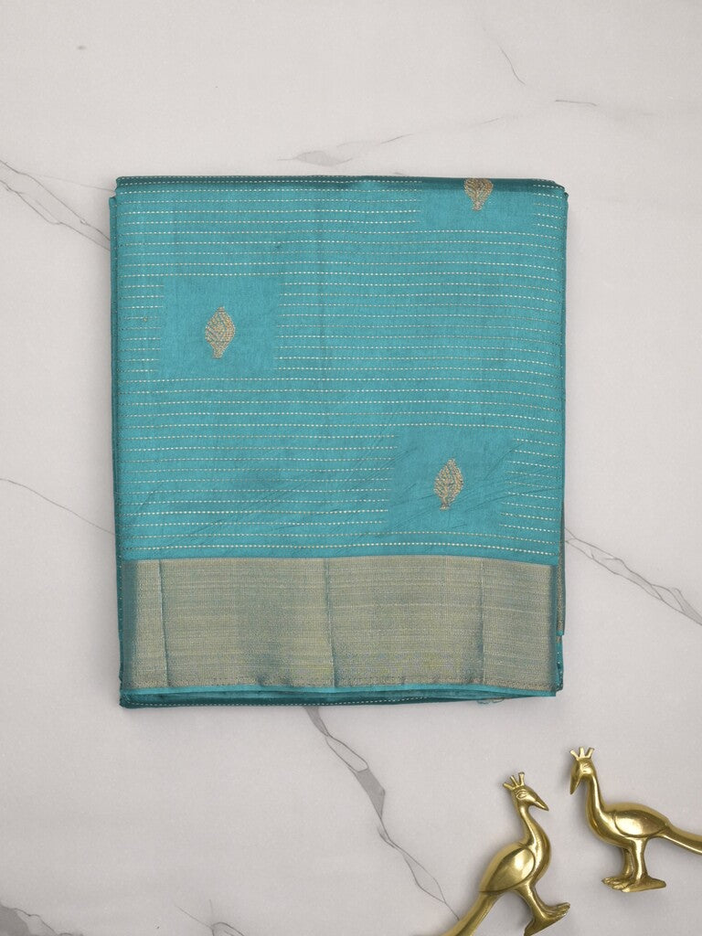 Dupion fancy saree sky blue color allover zari motifs & zari border with zari pallu and contrast plain blouse