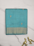 Dupion fancy saree sky blue color allover zari motifs & zari border with zari pallu and contrast plain blouse