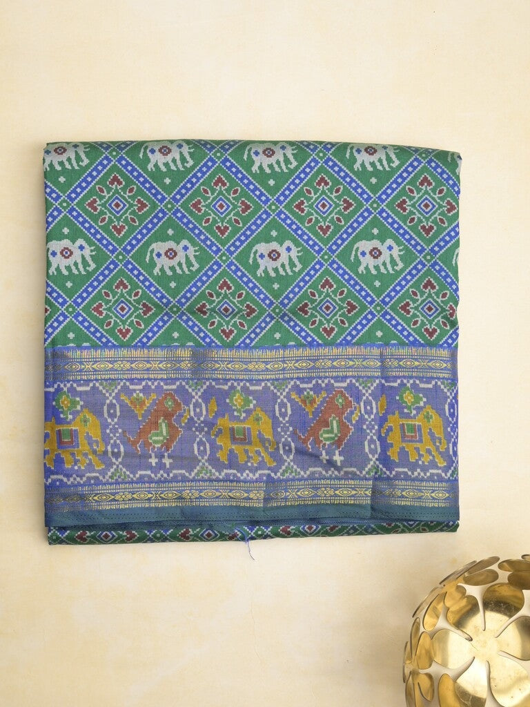 Ikkath fancy saree in green color allover design with zari border & ikkath pallu and plain blouse