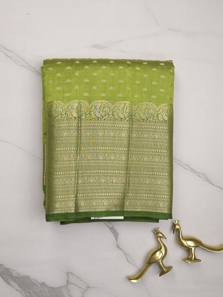 Dupion fancy saree parrot green color allover zari motifs & big zari border with zari pallu and contrast plain blouse