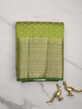 Dupion fancy saree parrot green color allover zari motifs & big zari border with zari pallu and contrast plain blouse