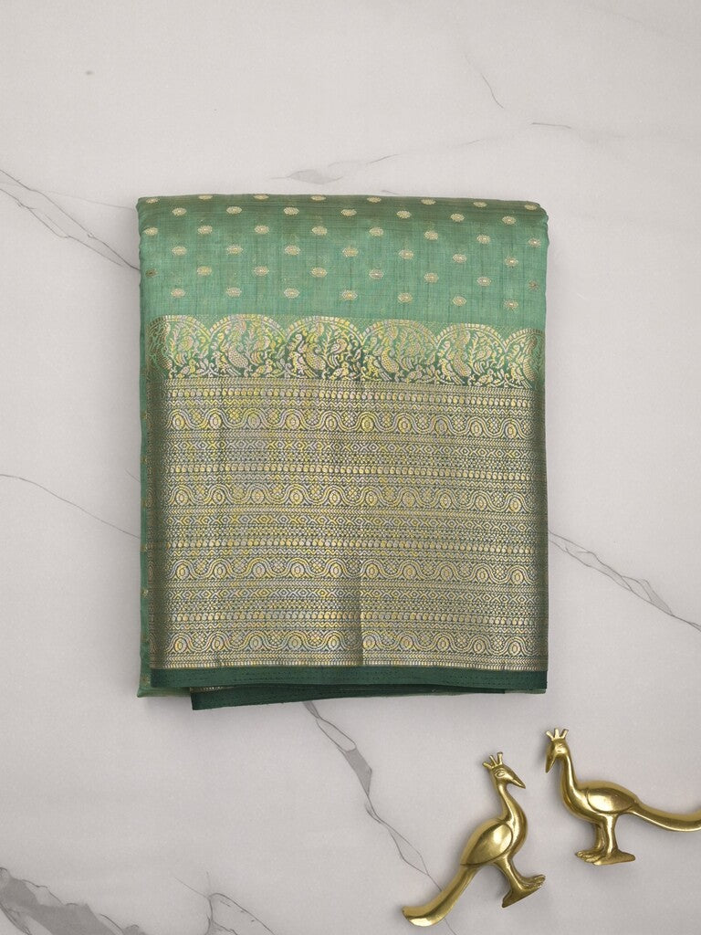 Dupion fancy saree lux green color allover zari motifs & big zari border with zari pallu and contrast plain blouse