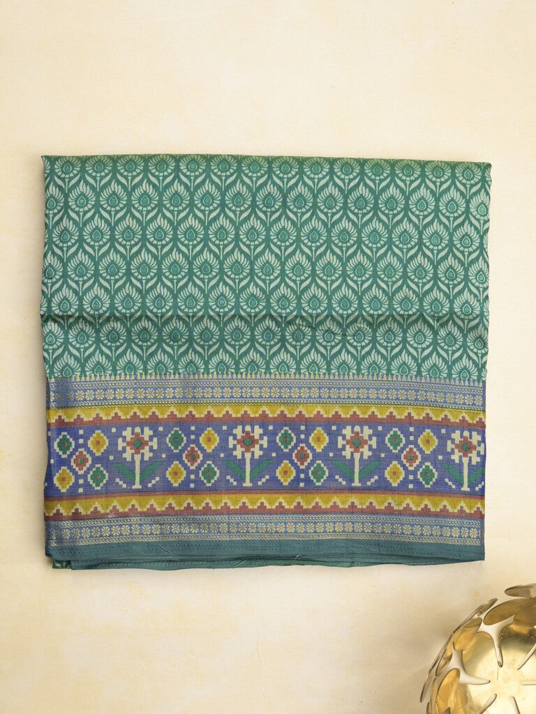 Ikkath fancy saree in peacock blue color allover design with zari border & ikkath pallu and plain blouse