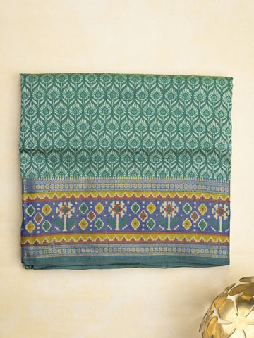 Ikkath fancy saree in peacock blue color allover design with zari border & ikkath pallu and plain blouse