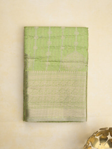 Chanderi kora fancy saree in green color with allover zari motifs & brocade pallu and blouse