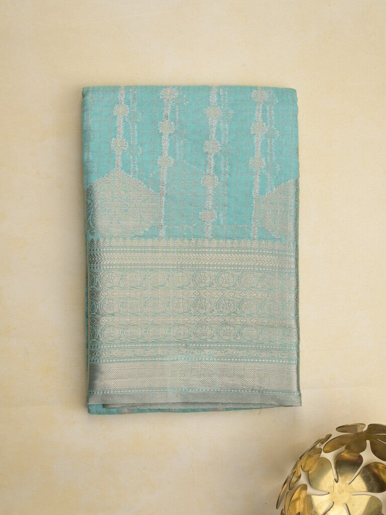 Chanderi kora fancy saree in sky blue color with allover zari motifs & brocade pallu and blouse