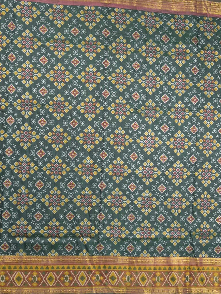 Ikkath fancy saree in dark green color allover design with zari border & ikkath pallu and plain blouse