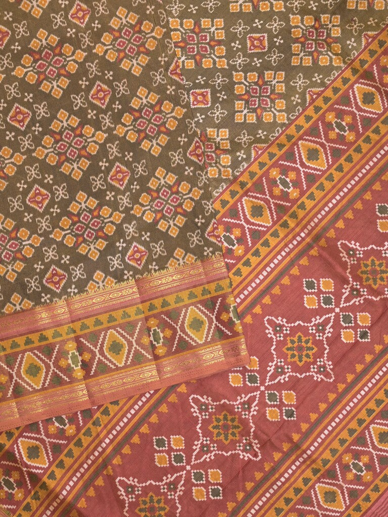 Ikkath fancy saree in brown color allover design with zari border & ikkath pallu and plain blouse