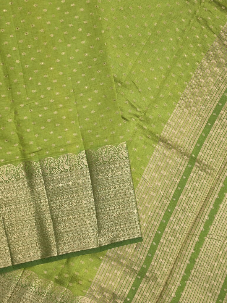 Dupion fancy saree parrot green color allover zari motifs & big zari border with zari pallu and contrast plain blouse