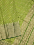 Dupion fancy saree parrot green color allover zari motifs & big zari border with zari pallu and contrast plain blouse