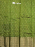 Dupion fancy saree parrot green color allover zari motifs & big zari border with zari pallu and contrast plain blouse