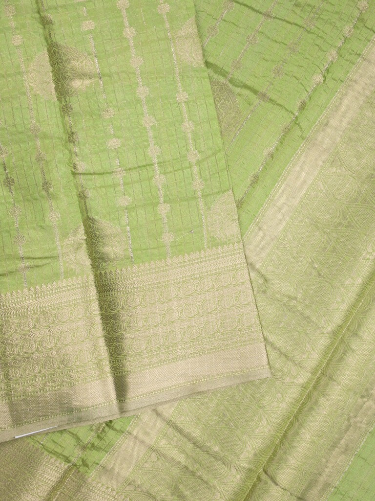 Chanderi kora fancy saree in green color with allover zari motifs & brocade pallu and blouse