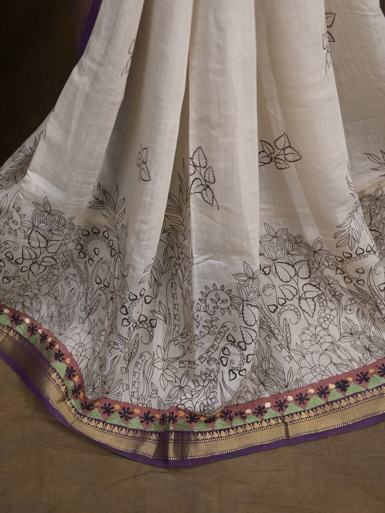 Maheshwari fancy saree in white color with allover prints & zari border with short pallu and contrast blouse