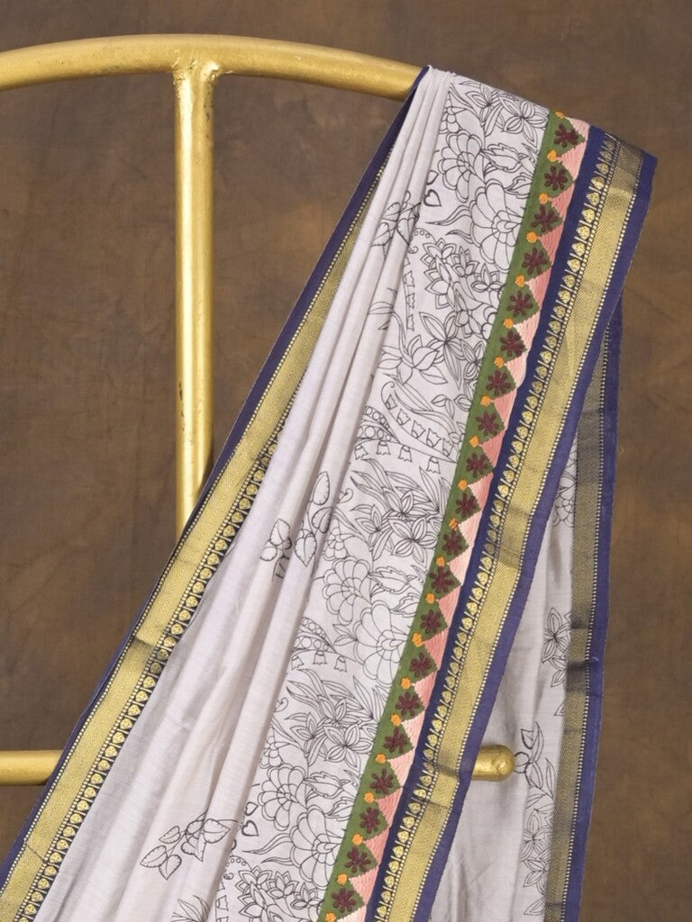 Maheshwari fancy saree in white color with allover prints & zari border with short pallu and contrast blouse
